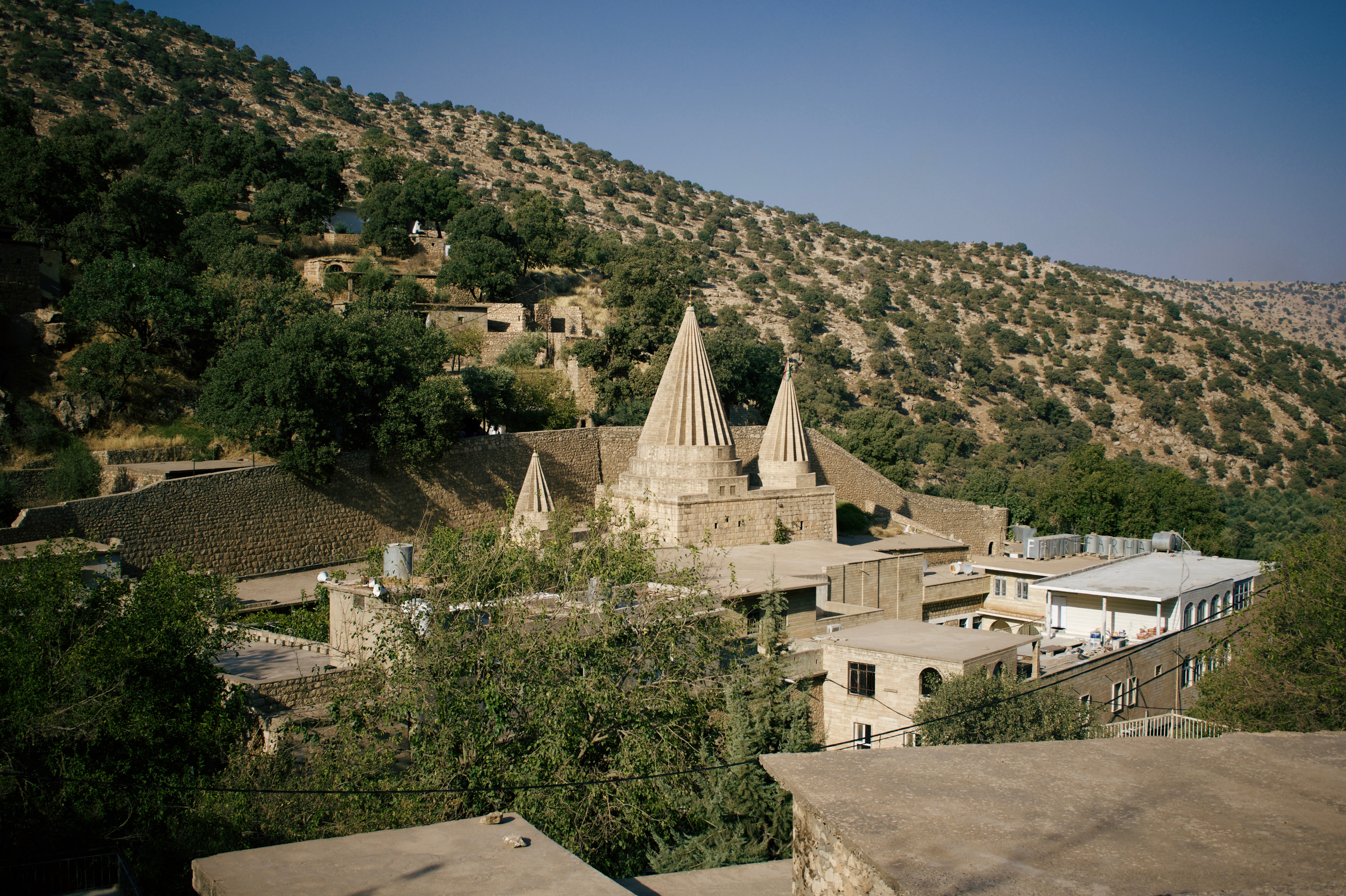Conical shrines of Lalish, the sacred Yazidi temple in the Kurdistan Region of Iraq